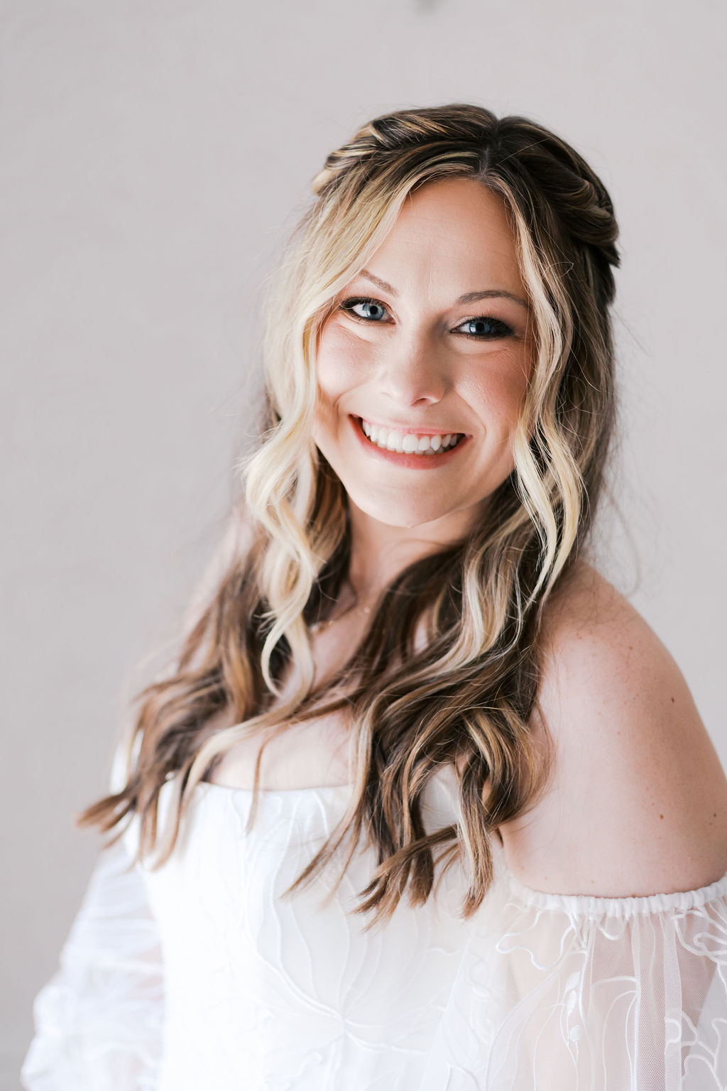 bridal portrait of a woman in an off the shoulder dress