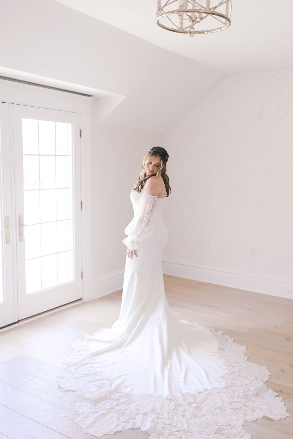 full length photo of bride in hawthorne house getting ready suites