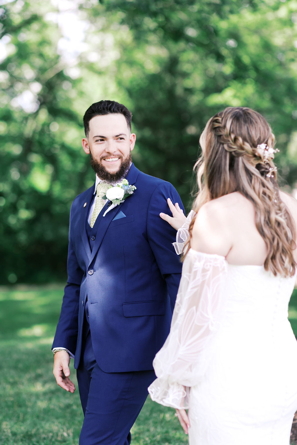 groom turning to look at bride for first look