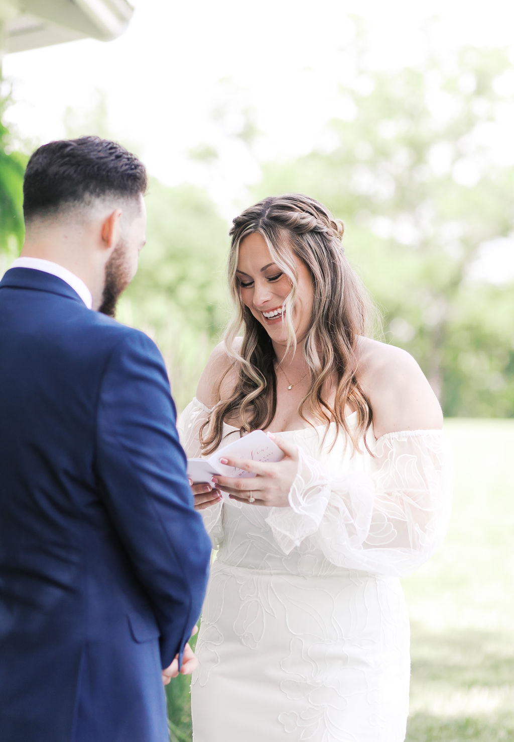 bride reading vows to groom