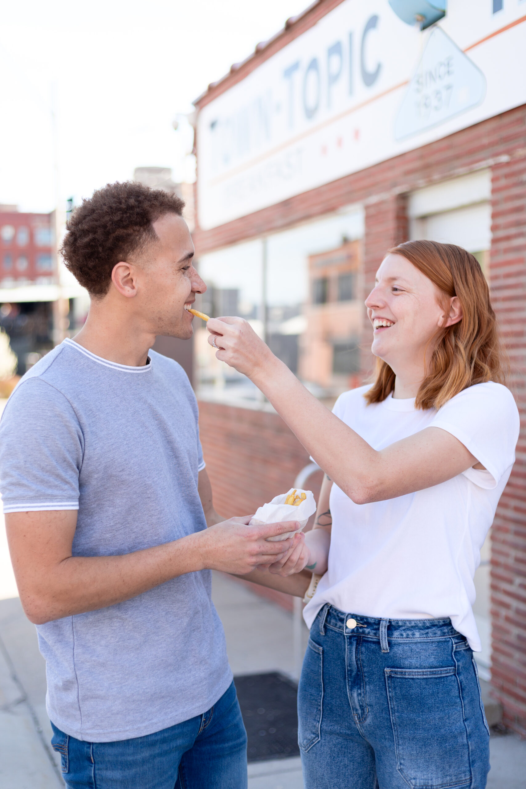 downtown kansas city engagement session town topic hamburgers