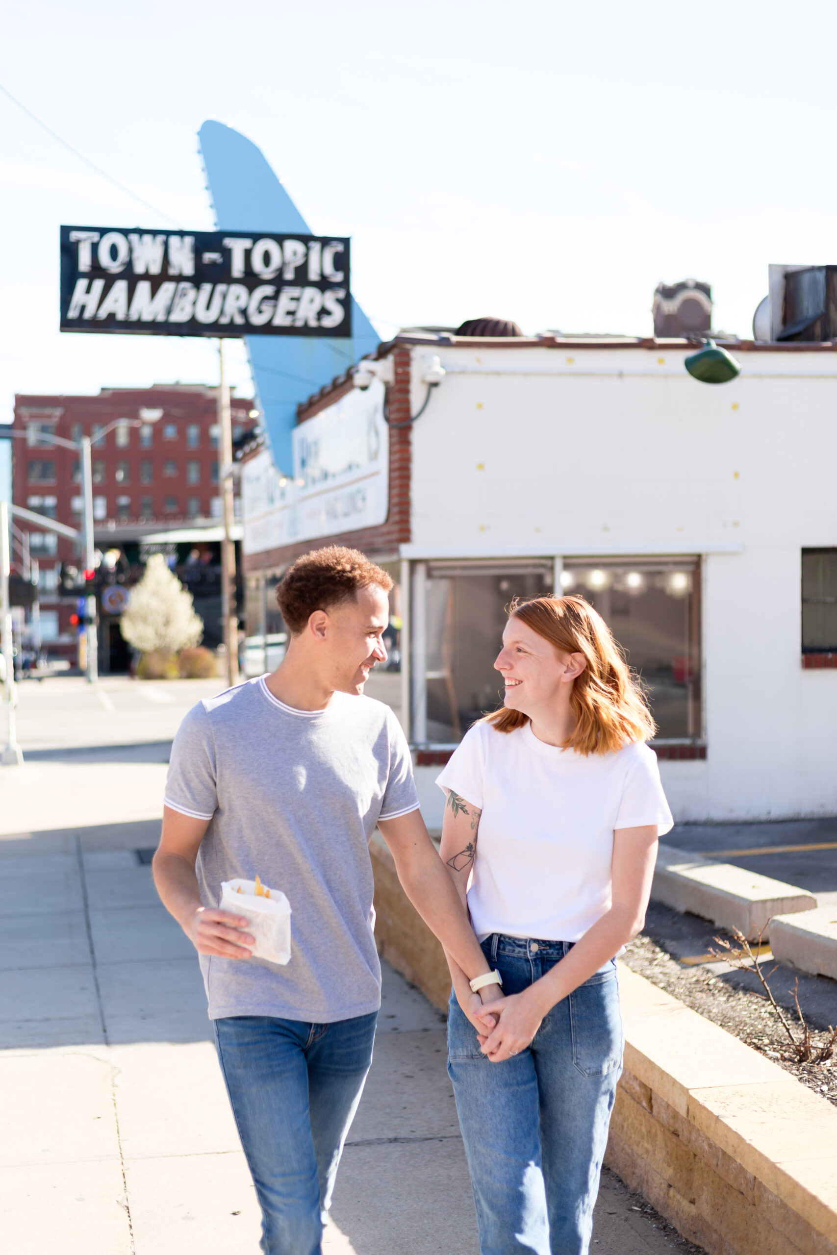 downtown kansas city engagement session town topic hamburgers