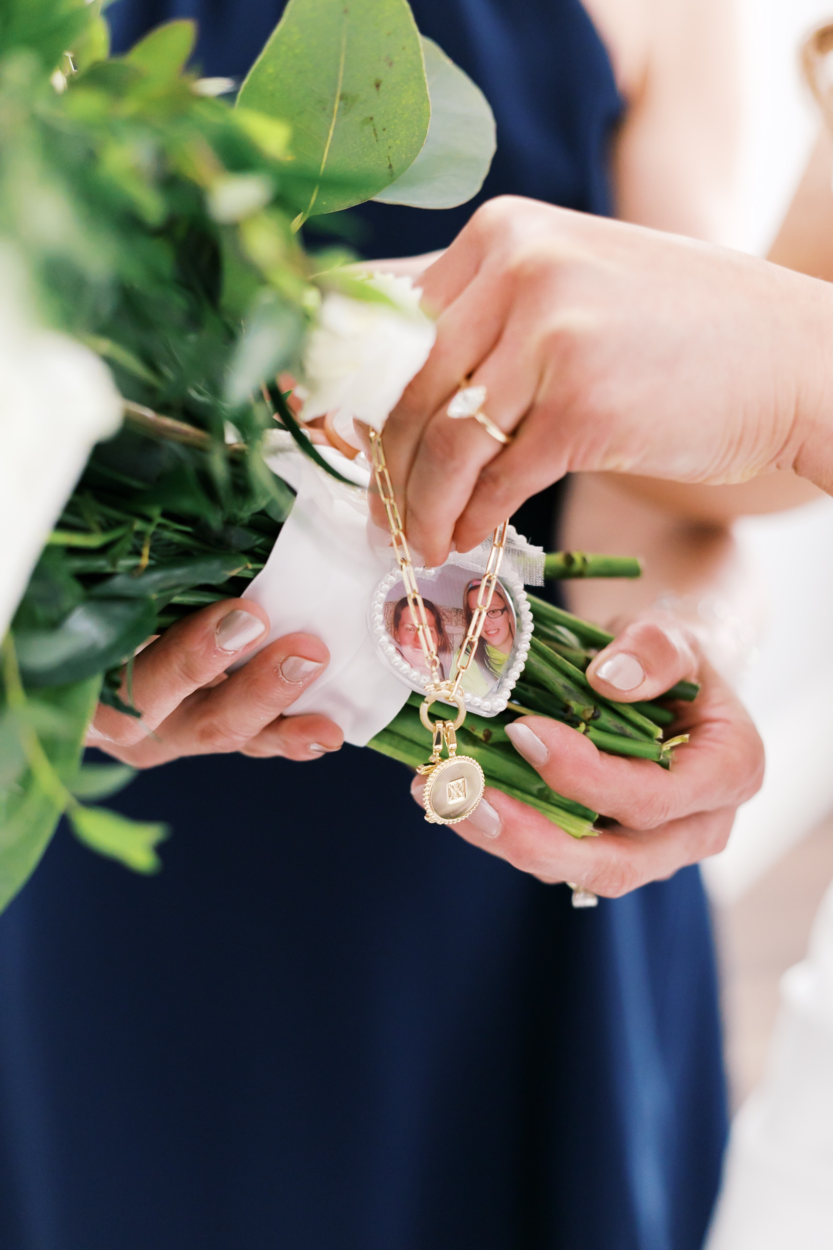 Close up of locket on bridal bouquet