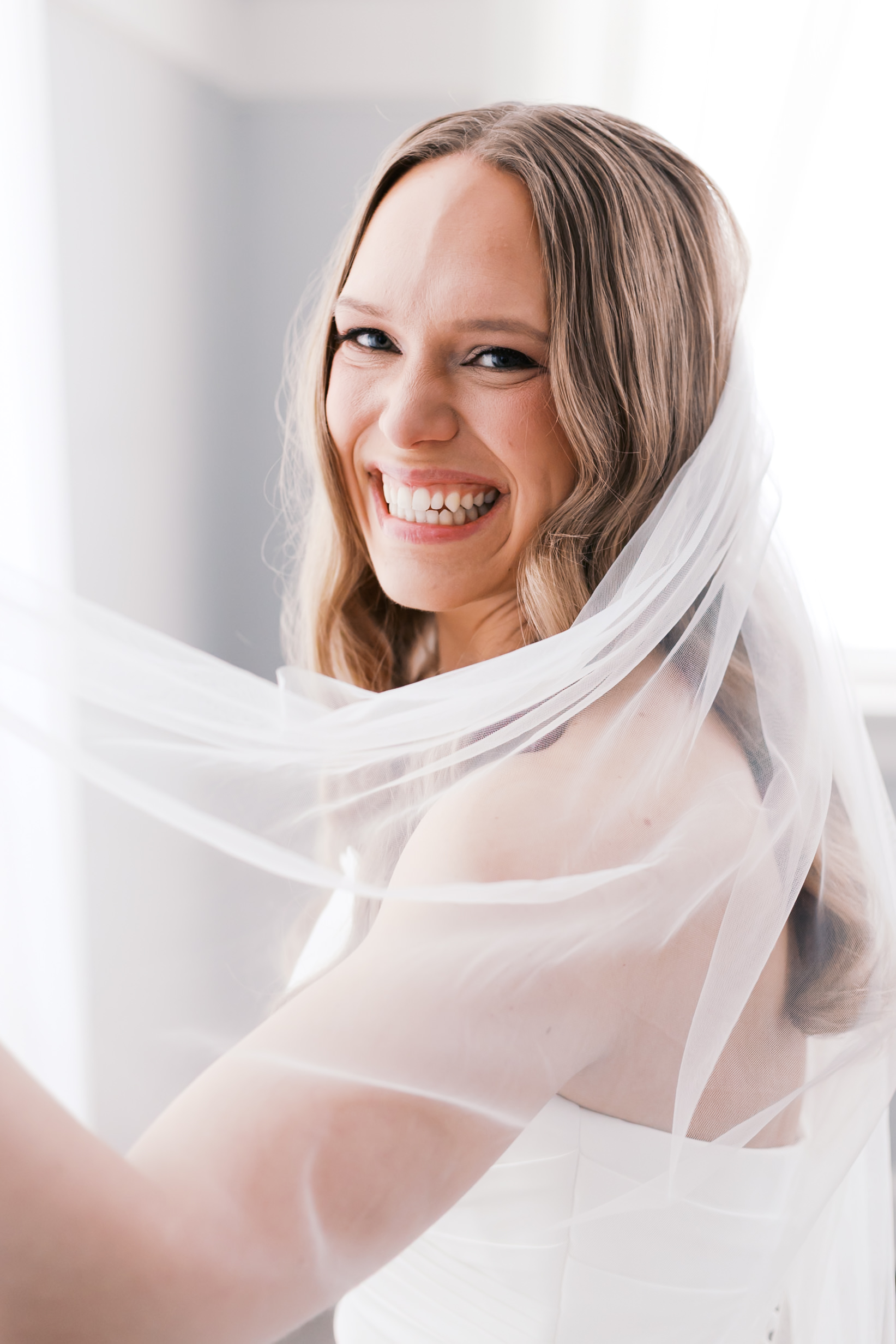 Closeup bridal portrait with draped veil