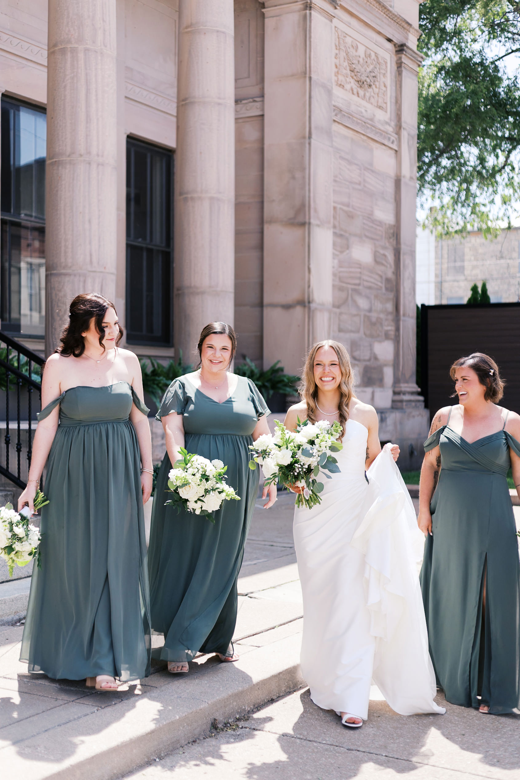 Bride and bridesmaids walking