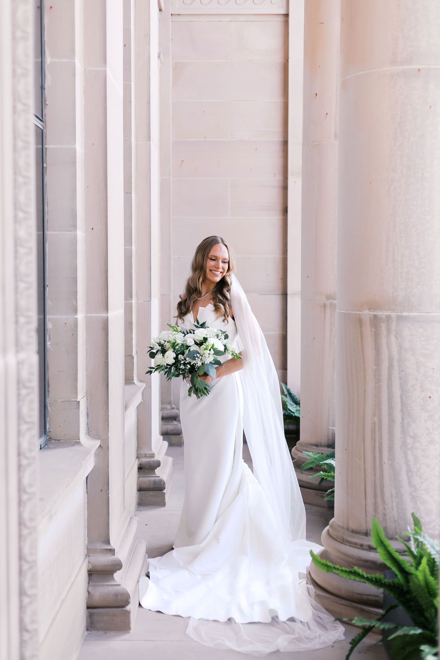 bridal portrait holding bouquet outside the Lincoln Event Space