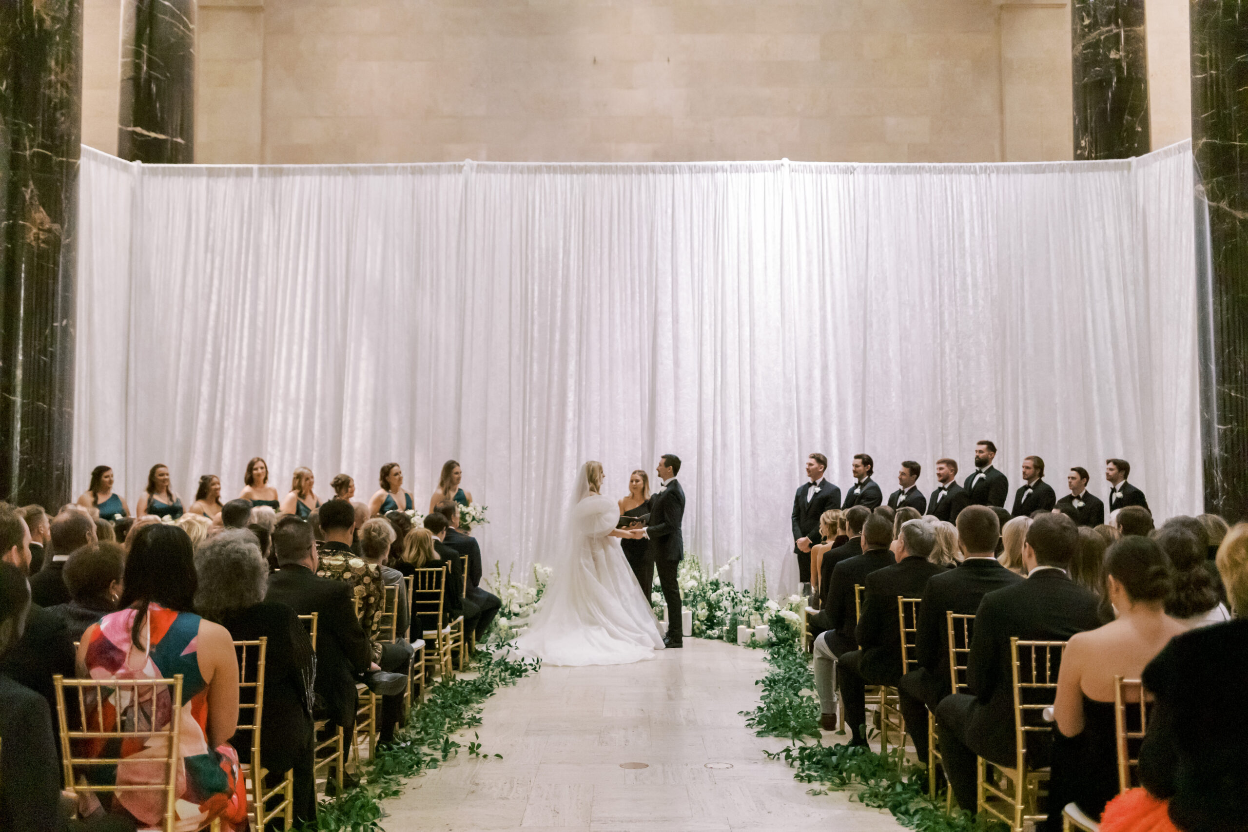 a luxury winter wedding inside of the nelson atkins museum of art in kansas city
