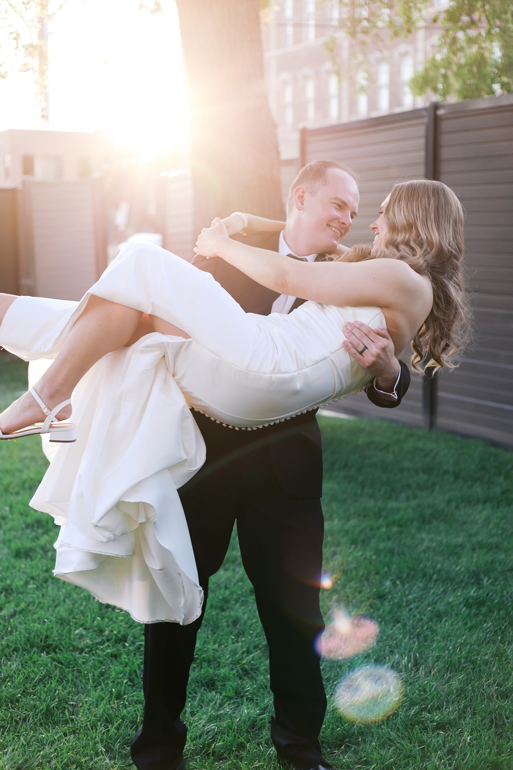 sunset photos for a summer wedding at the lincoln event space in kansas city