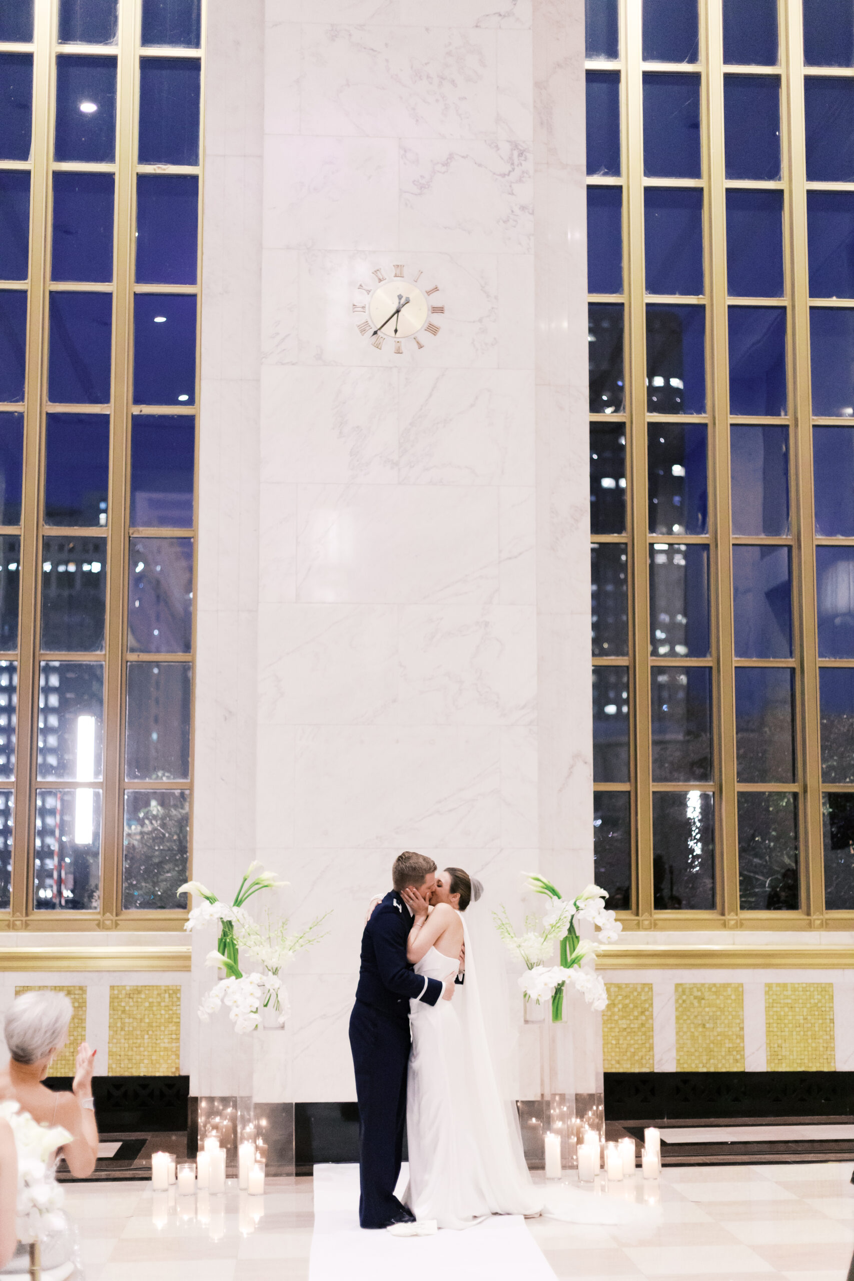 Bride and groom kiss at the end of the wedding ceremony